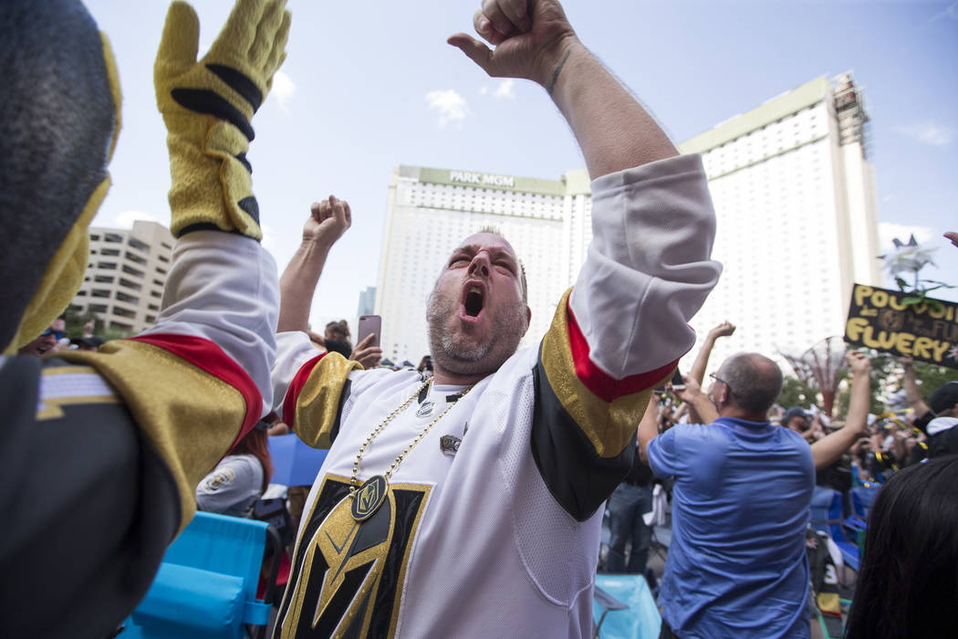 Golden Knights fans celebrate after the Knights defeated the Winnipeg Jets 2-1 during a watch party for Game 5 of the Western Conference Finals at Toshiba Plaza in Las Vegas on Sunday, May 20, 201 ...