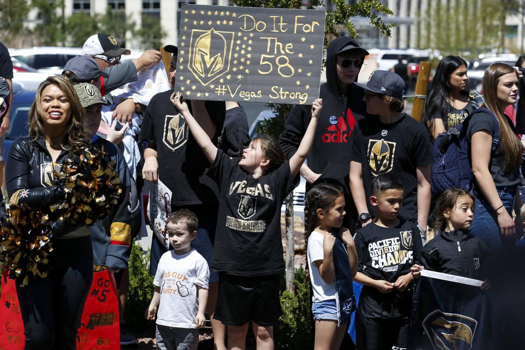 A Golden Knights fan holds up a sign outside City National Arena during a send-off event ahead of games three and four of the NHL playoff series against Los Angeles Kings on Saturday, April 14, 20 ...