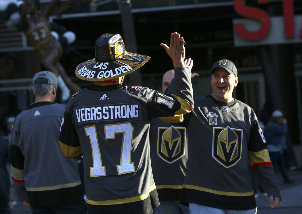 Golden Knights fans make their way to the Staples Center ahead of Game 4 of an NHL hockey first-round playoff series against the Los Angeles Kings on Tuesday, April 17, 2018. Chase Stevens Las Veg ...
