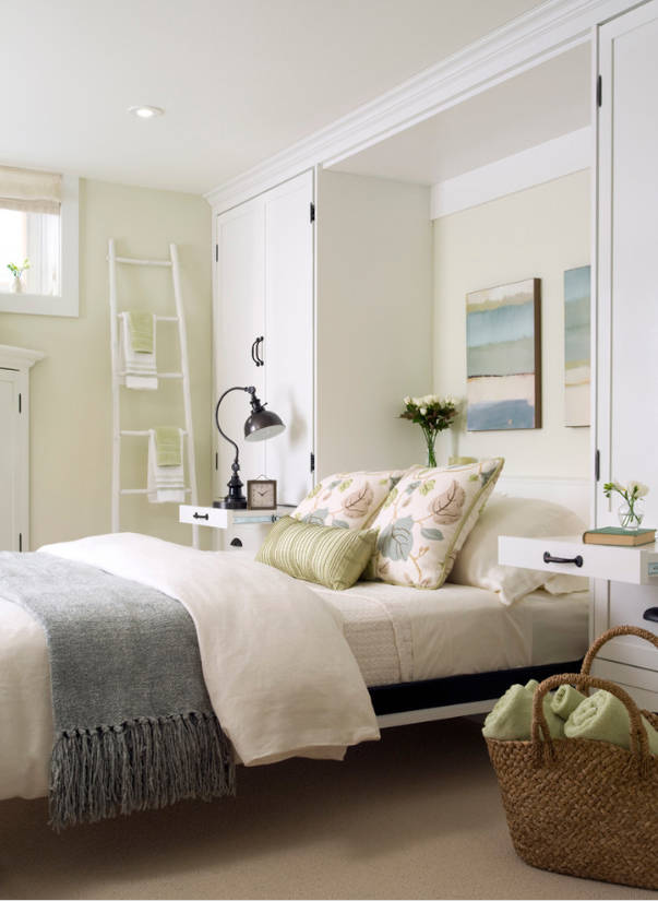 Houzz When guests arrive, this family room is quickly converted to a welcoming guest room with a pull-down Murphy bed. Night table trays pull out from the custom built-ins to hold a lamp or glass ...