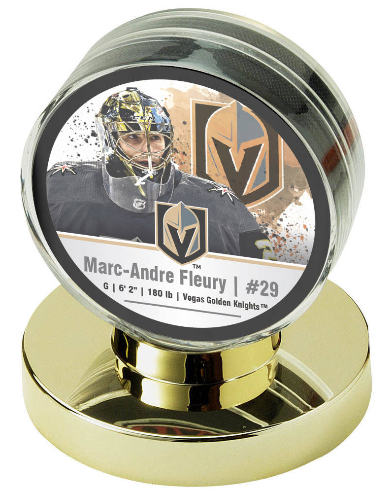 A Marc-Andre Fleury Vegas Golden Knights commemorative hockey puck, part of a four-puck set being sold by Nikco Sports Memorabilia, with a percentage of the sales going to the Golden Knights Found ...