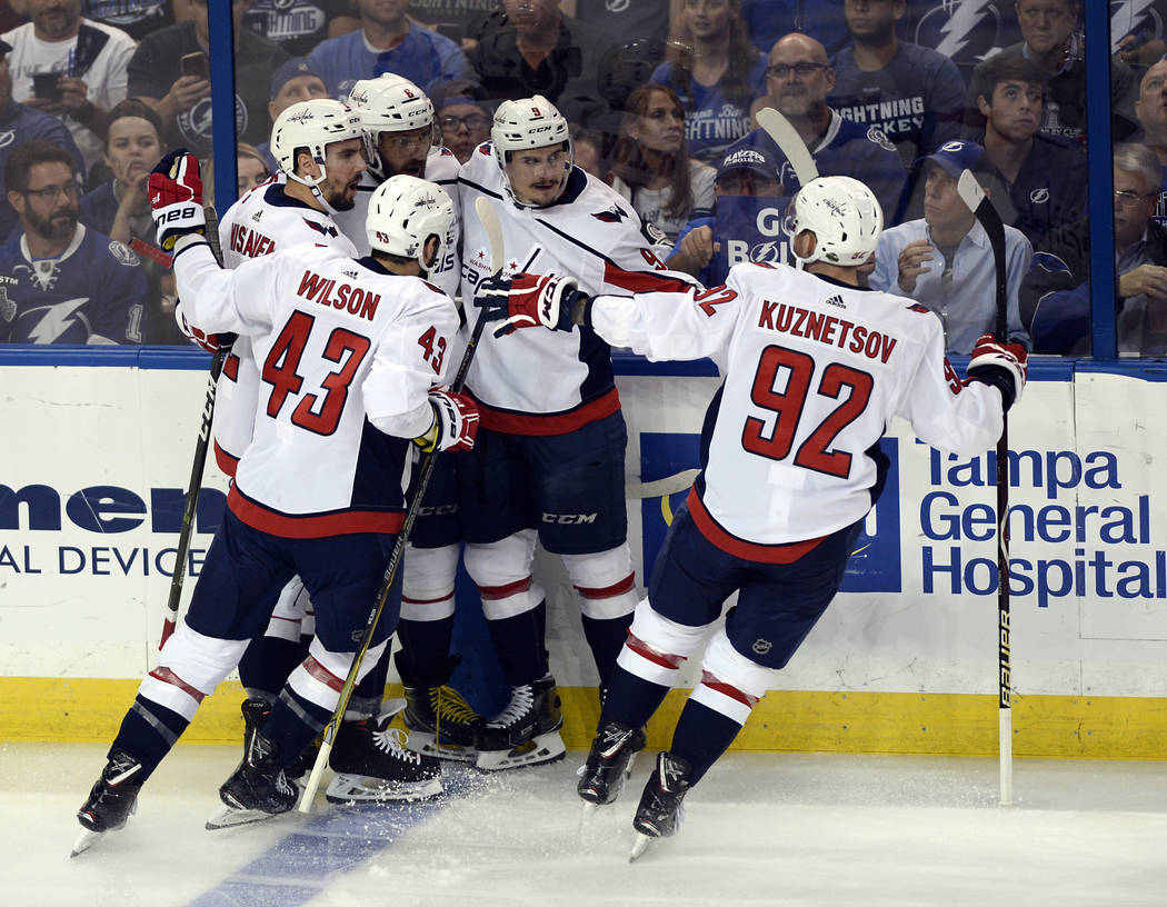 Washington Capitals players celebrate a goal against the Tampa Bay Lightning during the first period of Game 7 of the NHL Eastern Conference finals hockey playoff series Wednesday, May 23, 2018, i ...
