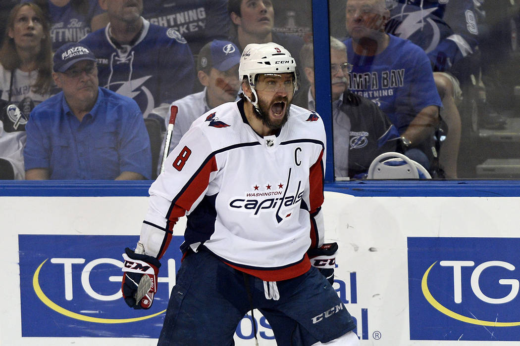 Washington Capitals left wing Alex Ovechkin celebrates a goal against the Tampa Bay Lightning during the first period of Game 7 of the NHL Eastern Conference finals hockey playoff series Wednesday ...