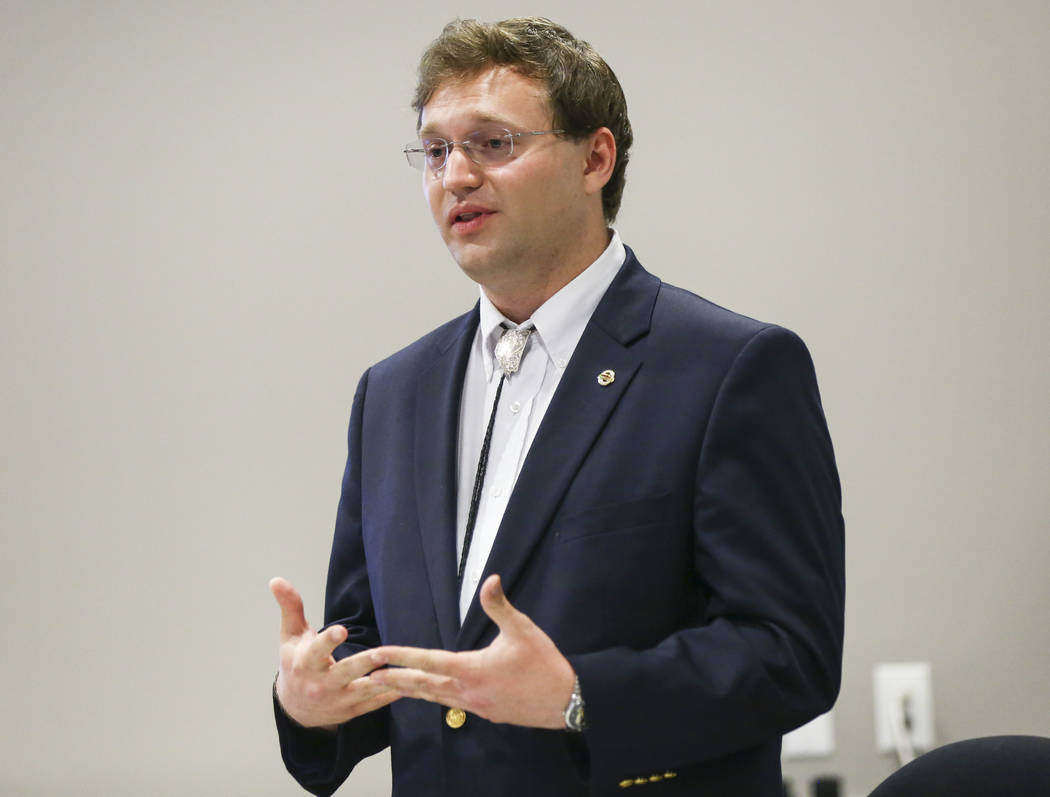 Andrew Coates, candidate for Nevada System of Higher Education Regent District 12, speaks during a panel of candidates running for Nevada's education boards held by the Guinn Center and Hope for N ...
