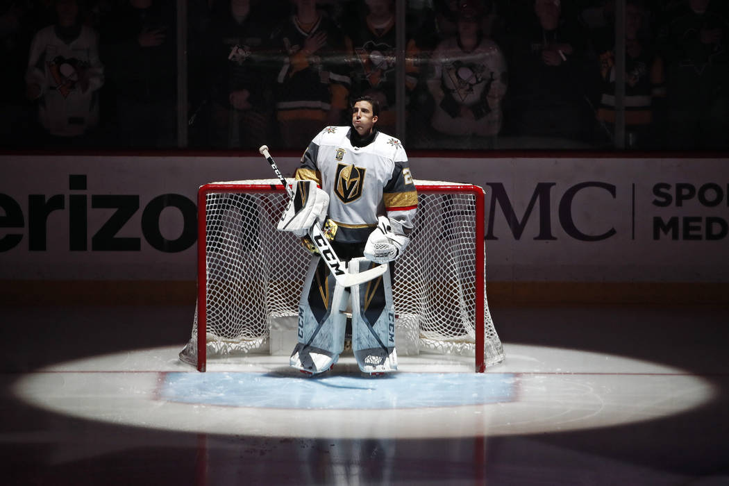 Vegas Golden Knights goaltender Marc-Andre Fleury (29) stands during the National Anthem before an NHL hockey game against his former team, the Pittsburgh Penguins, in Pittsburgh, Tuesday, Feb. 6, ...