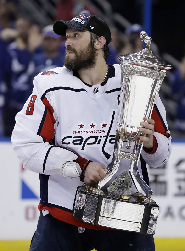 You need to buy the official Washington Capitals Eastern Conference  Champion shirts and hats
