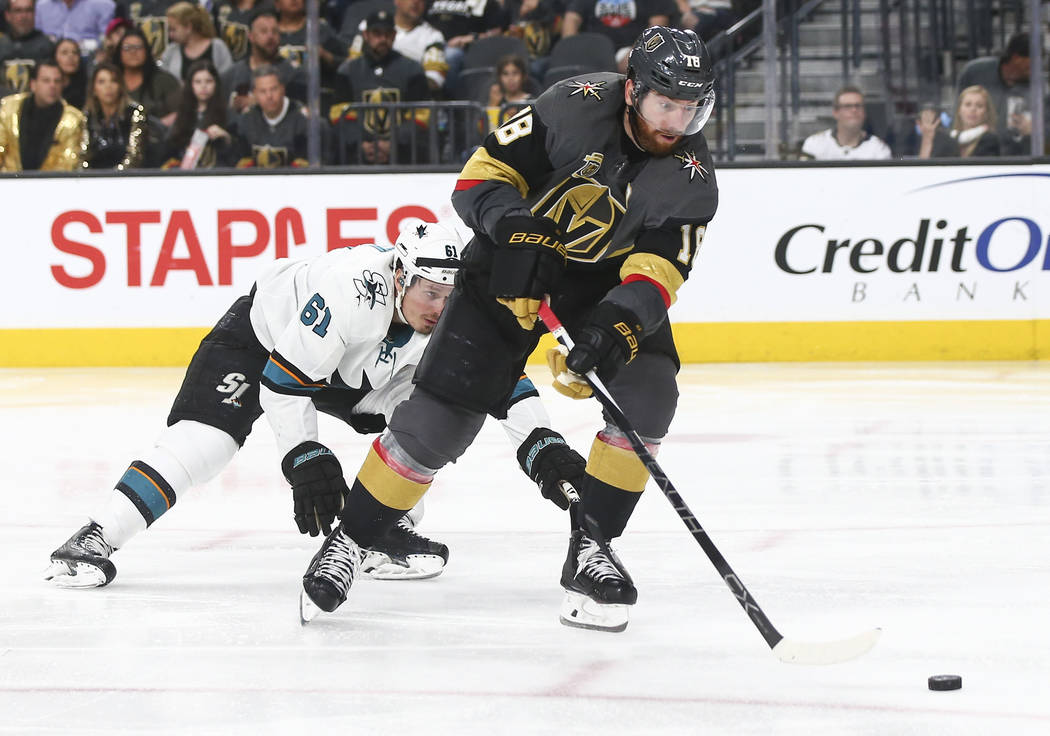 Golden Knights left wing James Neal (18) moves the puck in front of San Jose Sharks defenseman Justin Braun (61) during the third period of Game 5 of an NHL hockey second-round playoff series at T ...