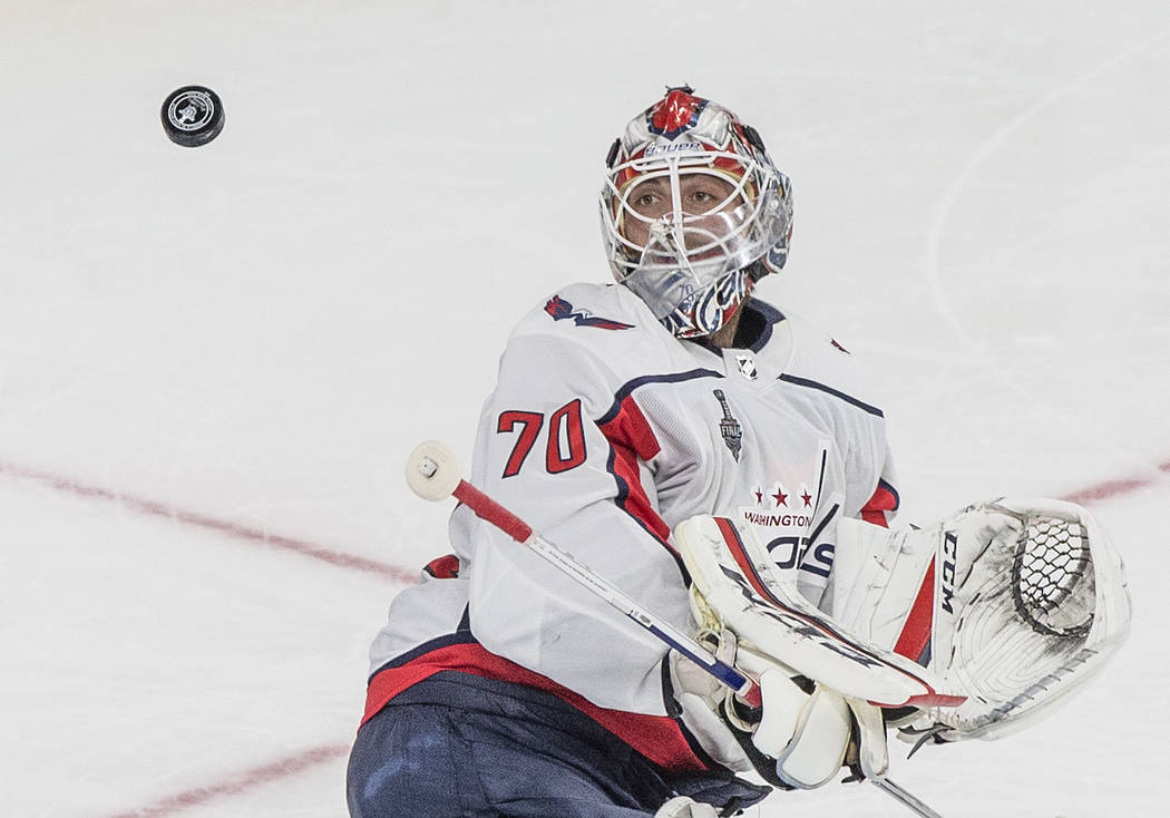Capitals goaltender Braden Holtby (70) makes a second-period save during Game 1 of the NHL Stanley Cup Finals against the Golden Knights on Monday, May 28, 2018, at T-Mobile Arena, in Las Vegas. B ...
