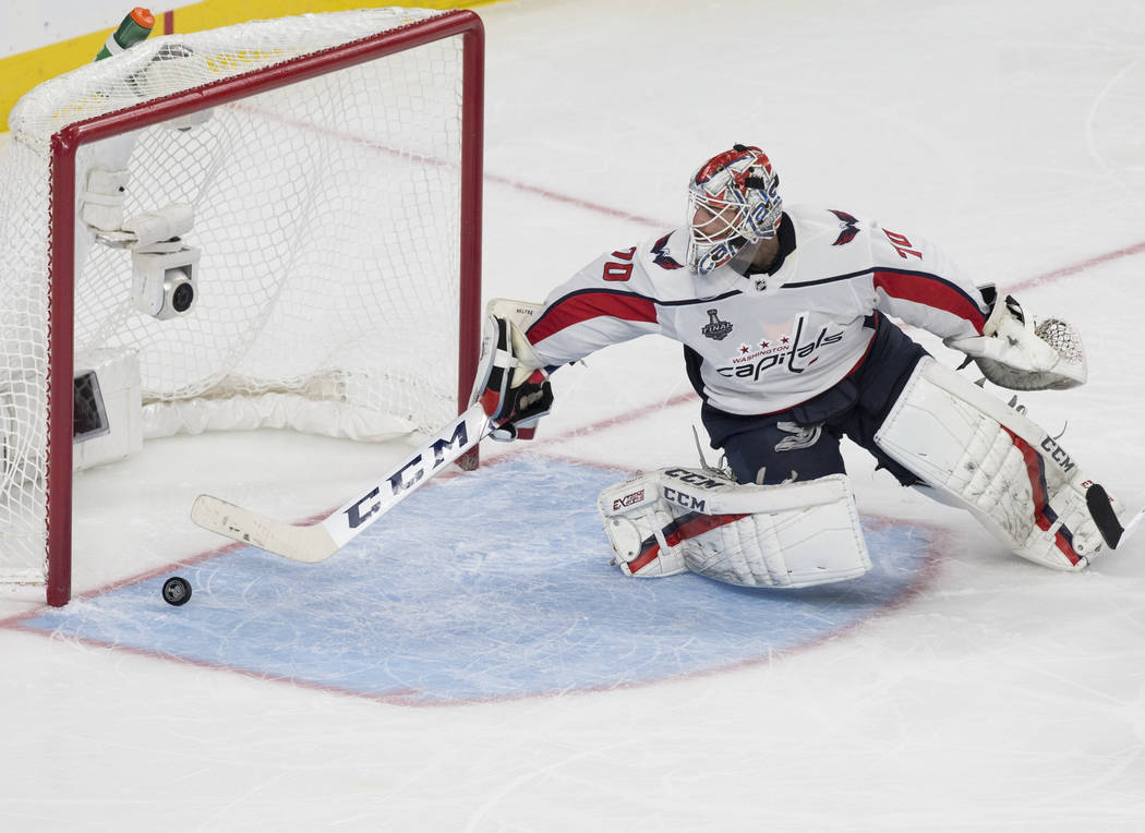 Capitals goaltender Braden Holtby (70) makes a second-period save during Game 1 of the NHL Stanley Cup Finals against the Golden Knights on Monday, May 28, 2018, at T-Mobile Arena, in Las Vegas. B ...