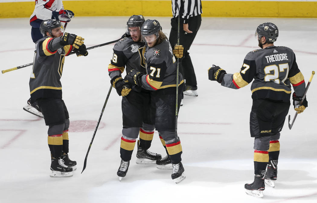 The Vegas Golden Knights celebrate a first period goal by center William Karlsson (71) in Game 1 of the NHL hockey Stanley Cup Finals between the Golden Knights and the Washington Capitals at T-Mo ...