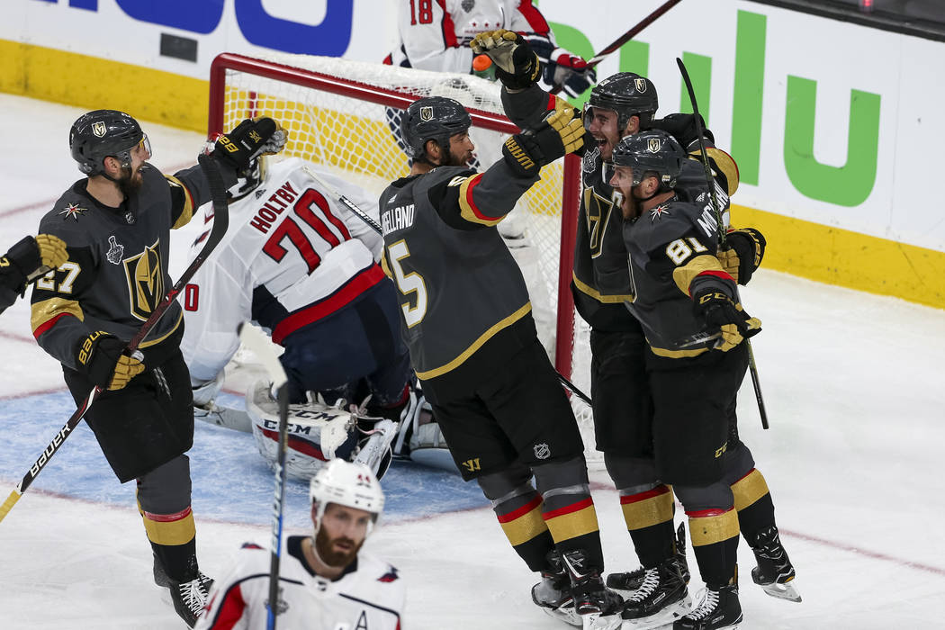 The Vegas Golden Knights celebrate a second period goal by right wing Reilly Smith (19) during the second period in Game 1 of the NHL hockey Stanley Cup Finals between the Golden Knights and the W ...