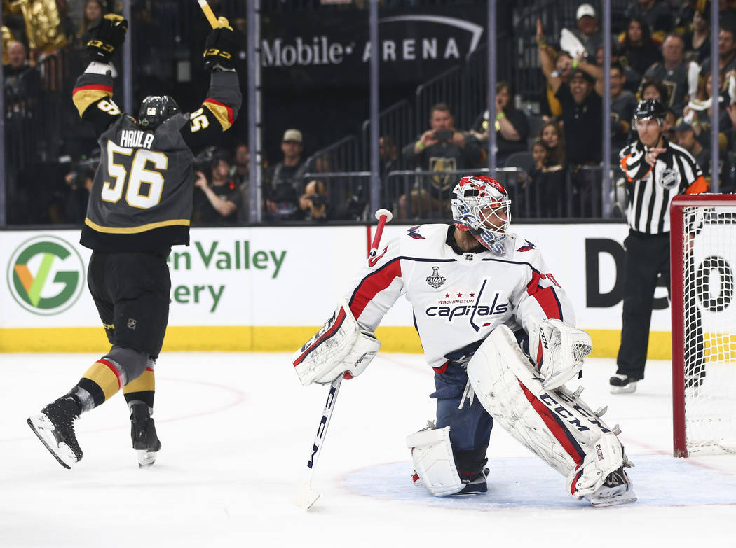 Golden Knights left wing Erik Haula (56) celebrates a goal by defenseman Colin Miller, not pictured, against Washington Capitals goaltender Braden Holtby (70) during the first period of Game 1 of ...