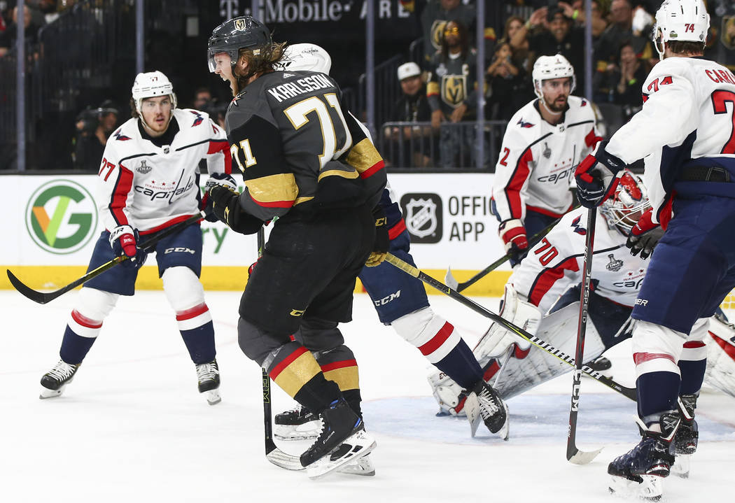 Golden Knights center William Karlsson (71) celebrates a goal against Washington Capitals goaltender Braden Holtby (70) during the first period of Game 1 of the NHL hockey Stanley Cup Final at the ...