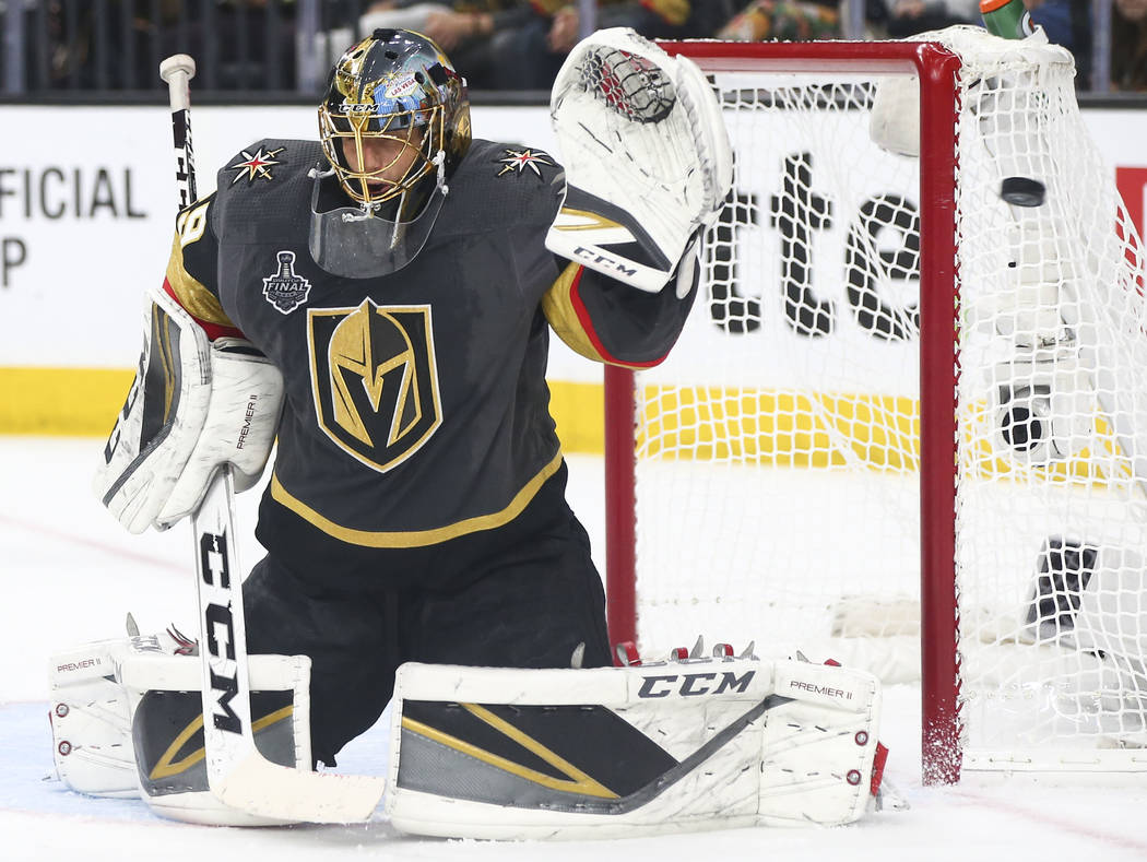 A shot goes past Golden Knights goaltender Marc-Andre Fleury (29) during the second period of Game 1 of the NHL hockey Stanley Cup Final against the Washington Capitals at the T-Mobile Arena in La ...