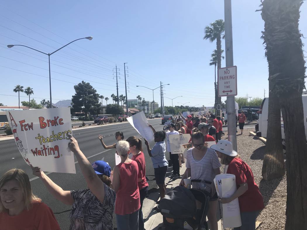 Educators rally outside the Edward Greer Education Center in Las Vegas to fight for pay raises on Saturday, April 28, just before community meetings for the six Clark County School District superi ...