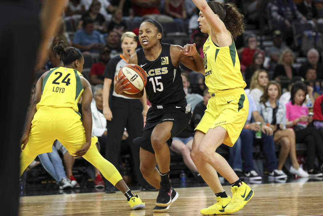 Las Vegas Aces guard Lindsay Allen (15) goes to the basket against Seattle Storm guard Sue Bird (10) in the second half of a WNBA basketball game at the Mandalay Bay Events Center in Las Vegas on ...