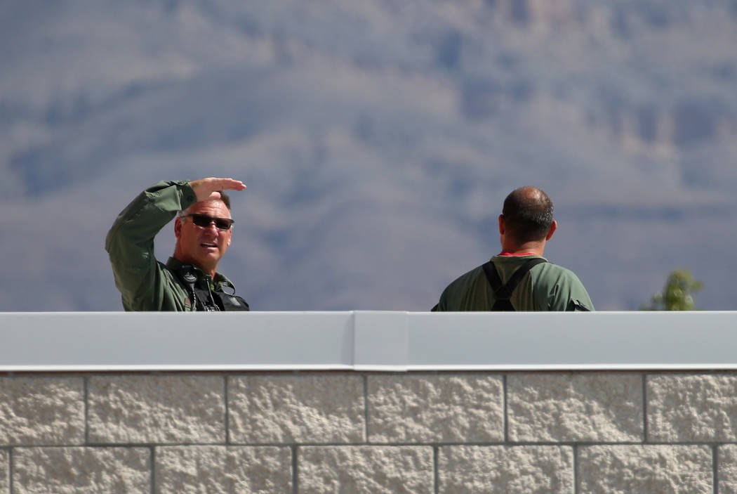 Las Vegas police officers are seen on the roof of Shadow Ridge High School during a mass shooting drill, coordinated by the Metropolitan Police Department and the various agencies in the area, on ...