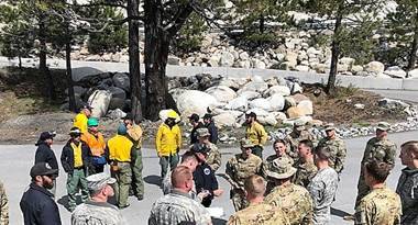 Multi-agency air mission briefing taking place before the mission. NIAS