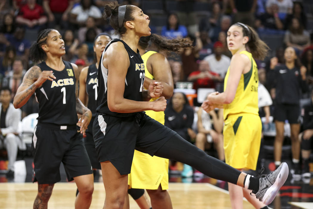 Las Vegas Aces center A'ja Wilson (22) reacts after getting fouled in the second half of a WNBA basketball game against the Seattle Storm at the Mandalay Bay Events Center in Las Vegas on Sunday, ...