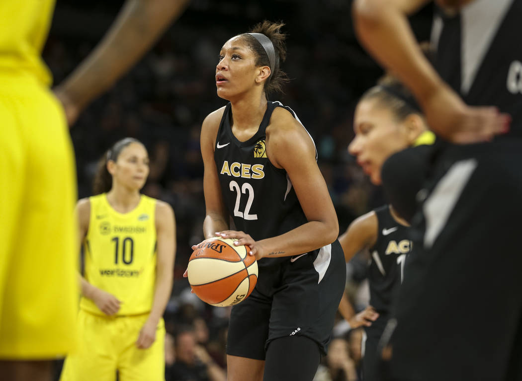 Las Vegas Aces center A'ja Wilson (22) prepares to shoot a free throw against the Seattle Storm in the second half of a WNBA basketball game at the Mandalay Bay Events Center in Las Vegas on Sunda ...