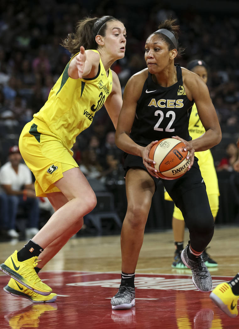 Seattle Storm forward Breanna Stewart (30) defends against Las Vegas Aces center A'ja Wilson (22) in the second half of a WNBA basketball game at the Mandalay Bay Events Center in Las Vegas on Sun ...