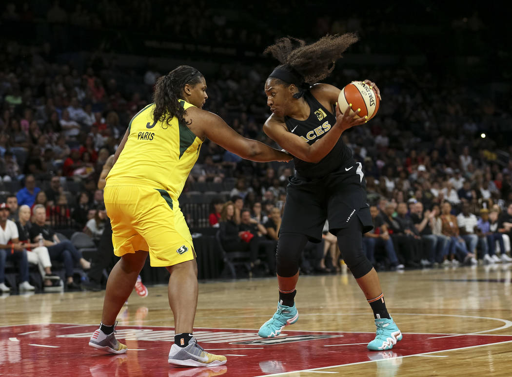 Seattle Storm center Courtney Paris (3) defends against Las Vegas Aces center Kelsey Bone (3) in the second half of a WNBA basketball game at the Mandalay Bay Events Center in Las Vegas on Sunday, ...