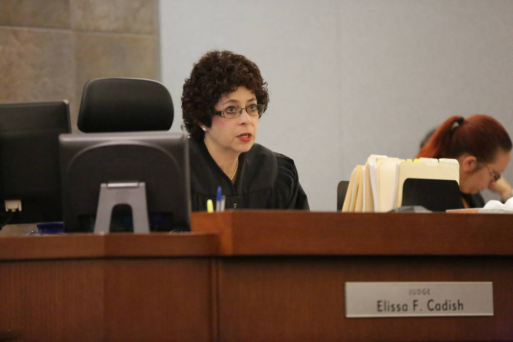 Judge Elissa F. Cadish hands down a judgment to Michael Banco during