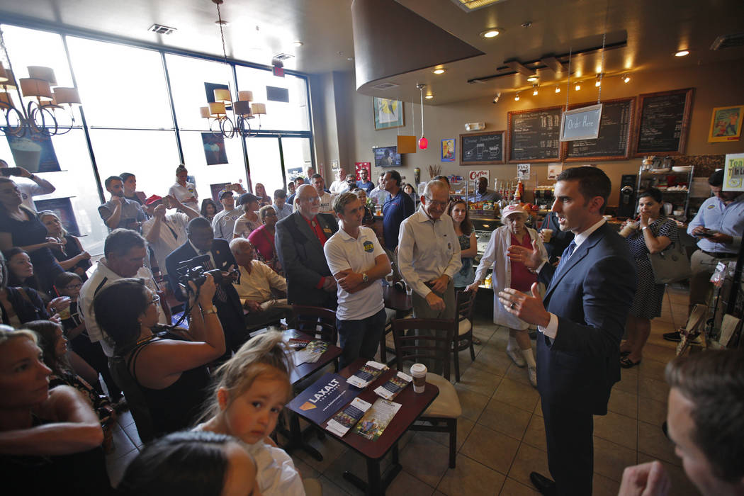 Wes Duncan, a Republican running for Attorney General, speaks to the crowd at a "Get-Out-The-Vote" campaign at Avery's Coffee Shop in Las Vegas, Wednesday, May 30, 2018. Adam Laxalt, a R ...