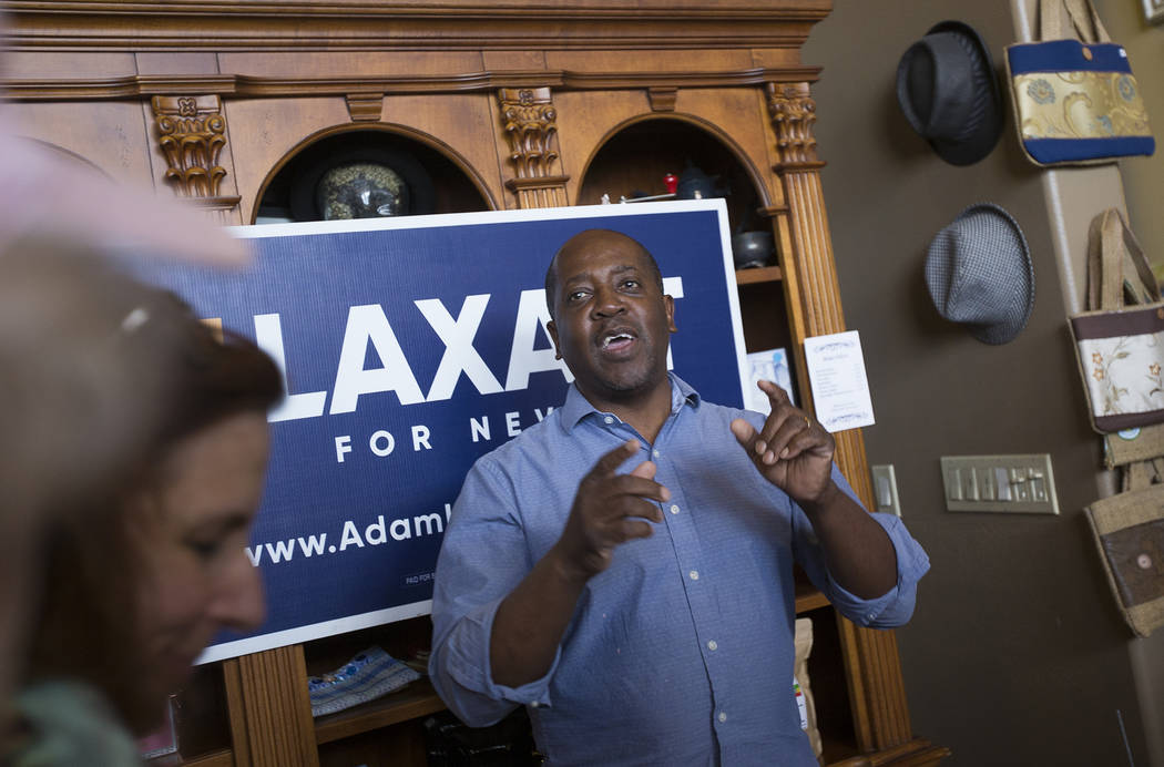 Sherman Gray, owner of Avery's Coffee Shop, greets the crowd at a "Get-Out-The-Vote" campaign at Avery's Coffee Shop in Las Vegas, Wednesday, May 30, 2018. Adam Laxalt, a Republican runn ...