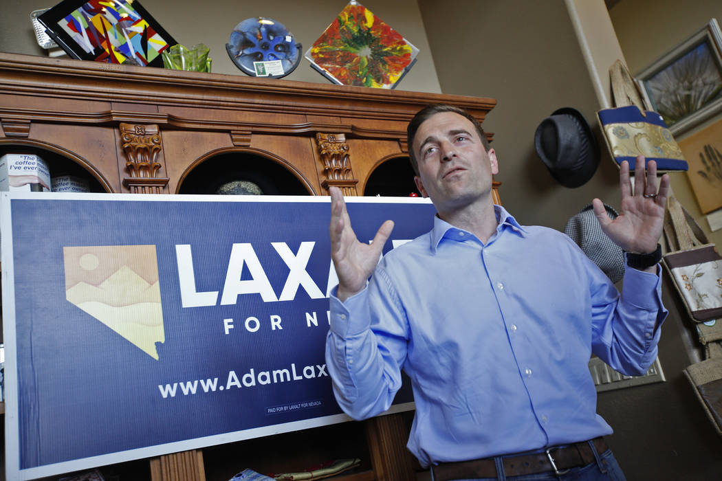 Adam Laxalt, a Republican running for Governor, speaks to the crowd at a "Get-Out-The-Vote" campaign at Avery's Coffee Shop in Las Vegas, Wednesday, May 30, 2018. Laxalt and Danny Tarka ...