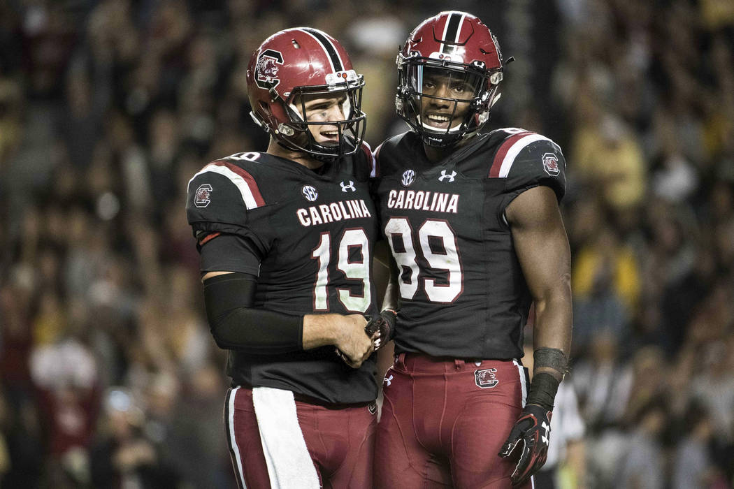 South Carolina quarterback Jake Bentley (19) and Bryan Edwards (89) celebrate after a touchdown during the second half of an NCAA college football game against Wofford on Saturday, Nov. 18, 2017 i ...