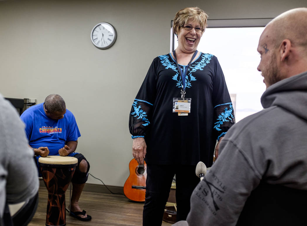 Music therapist Judith Pinkerton shares a moment with Josh Thomas while working in a session with recovering addicts at the Resolutions Recovery center in Las Vegas on Tuesday, April 26, 2018. Pa ...