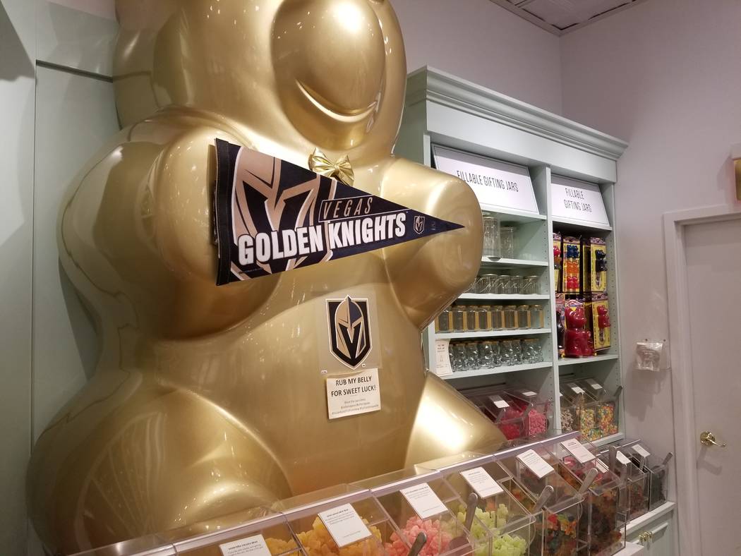 A nearly 5-foot golden bear statue sits above an assortment of candy Tuesday, May 29, 2018, at the Lolli & Pops candy store at the Fashion Show shopping center. Wade Tyler Millward Las Vegas Revie ...