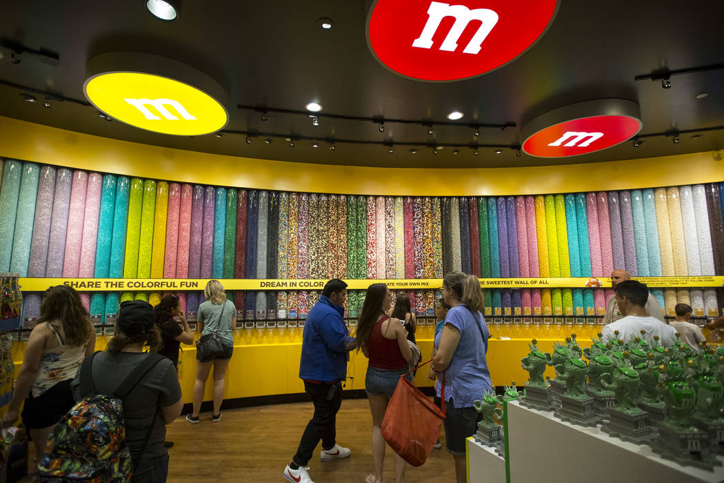 Patrons shop for candy at M&M's World in Las Vegas on Thursday, May 31, 2018. Richard Brian Las Vegas Review-Journal @vegasphotograph