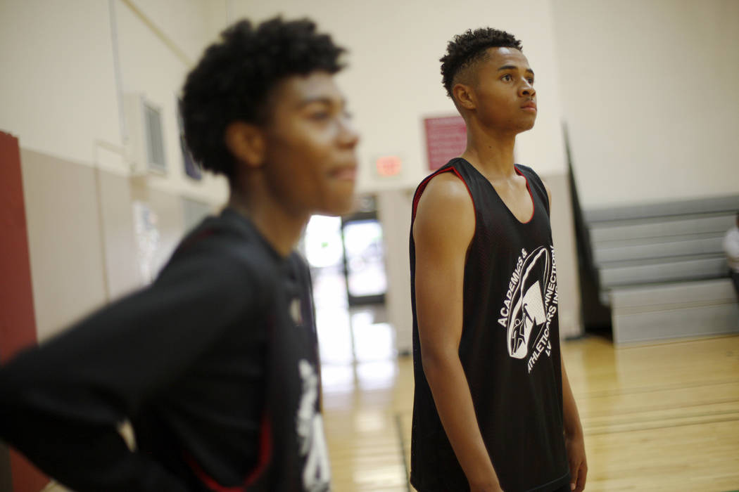Darwin Page, 15, left, and D'Andre Burnett, wait for their turn during basketball practice for the LV Stars at the Chuck Minker Sports Complex in Las Vegas, Tuesday, May 8, 2018. Rachel Aston Las ...