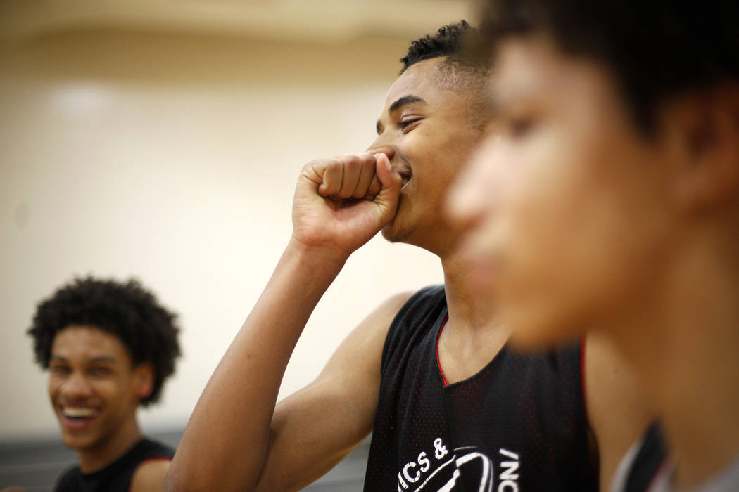 Jordan Carter, 18, from left, D'Andre Burnett, and Jordan McGriff laugh during basketball practice for the LV Stars at the Chuck Minker Sports Complex in Las Vegas, Tuesday, May 8, 2018. Rachel As ...