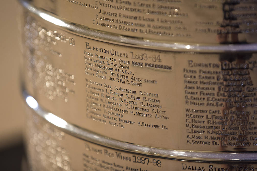 The engraving of the 1983-1984 Edmonton Oilers hockey team on the Stanley Cup on display at The Westin hotel in Las Vegas on Friday, April 6, 2018. Richard Brian Las Vegas Review-Journal @vegaspho ...