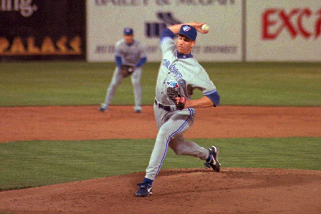 Toronto Blue Jays starting pitcher Erik Hanson pitches to an Oakland Athletics batter in the first inning, Monday night, April 1, 1996 at Cashman Field in Las Vegas. Hanson was credited with win d ...
