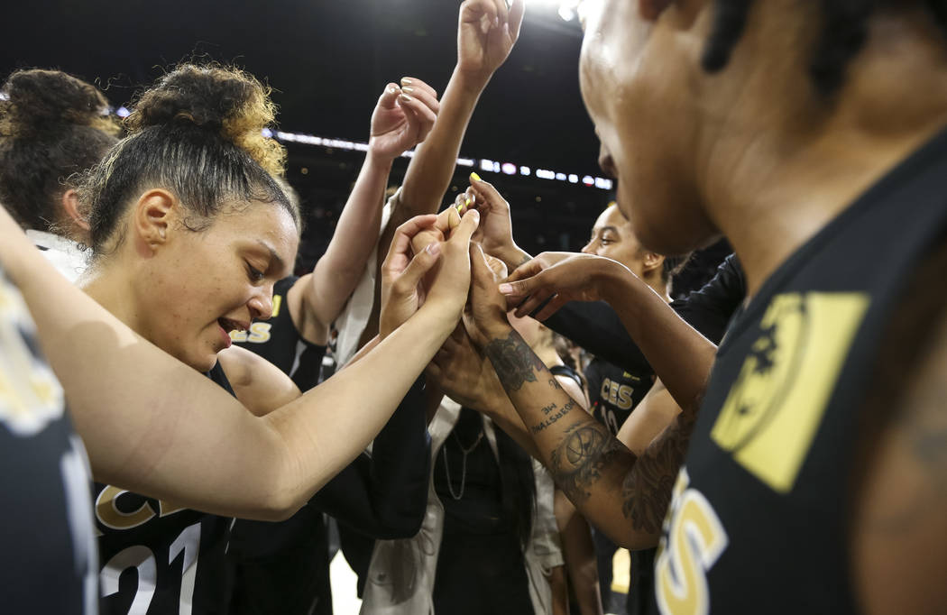 The Las Vegas Aces celebrate their 85-73 victory over the Washington Mystics following a WNBA basketball game at the Mandalay Bay Events Center in Las Vegas on Friday, June 1, 2018. Richard Brian ...