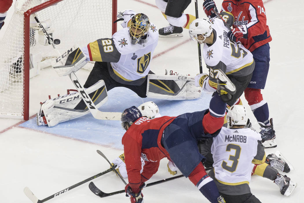 Capitals left wing Alex Ovechkin (8) scores a second-period goal against Golden Knights goaltender Marc-Andre Fleury (29) during Game 3 of the NHL Stanley Cup Final on Saturday, June 2, 2018, at C ...
