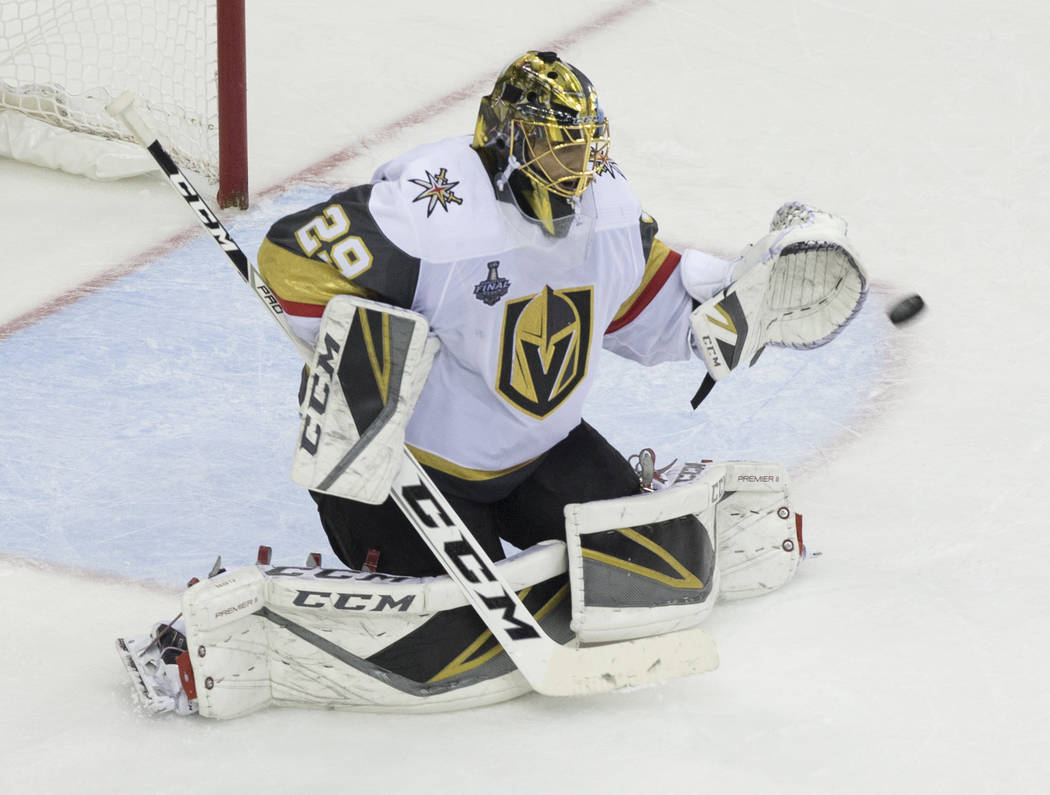 Golden Knights goaltender Marc-Andre Fleury (29) makes a save in the second period during Game 3 of the NHL Stanley Cup Final against the Washington Capitals on Saturday, June 2, 2018, at Capital ...