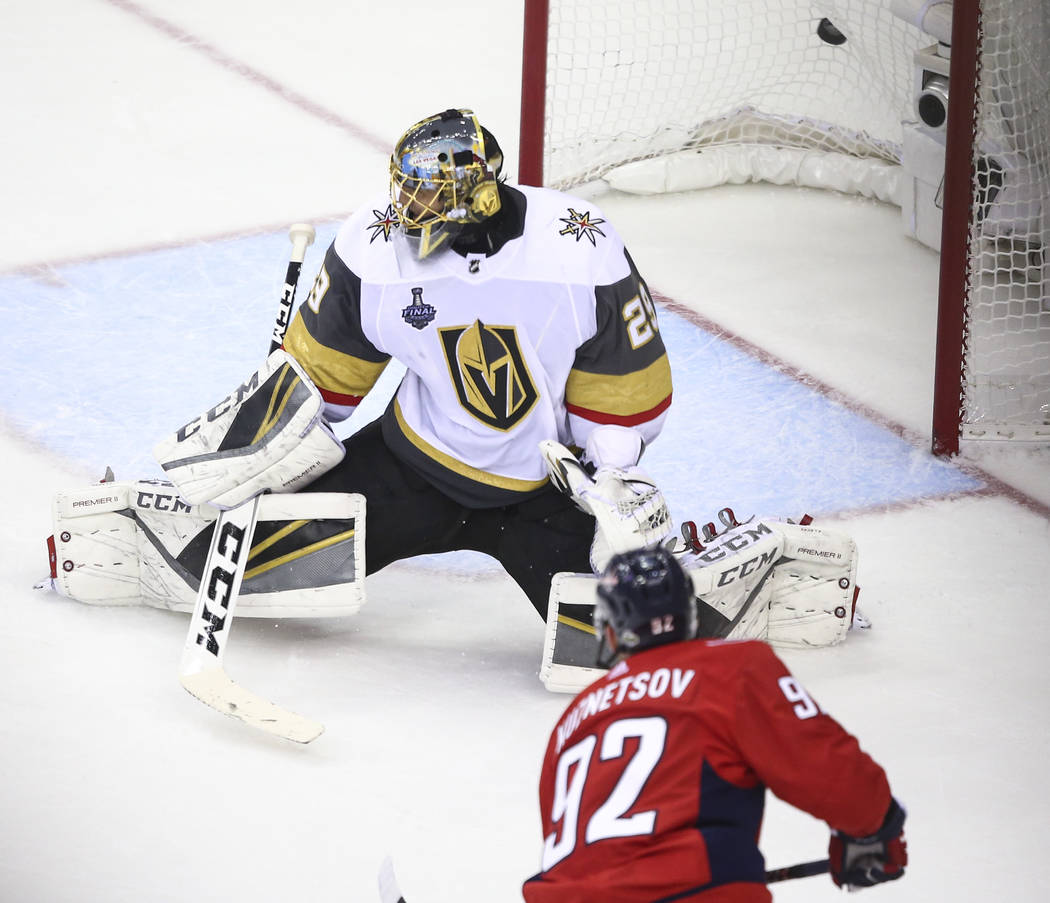 Washington Capitals center Evgeny Kuznetsov (92) scores past Golden Knights goaltender Marc-Andre Fleury (29) during the second period of Game 3 of the NHL hockey Stanley Cup Final at Capital One ...