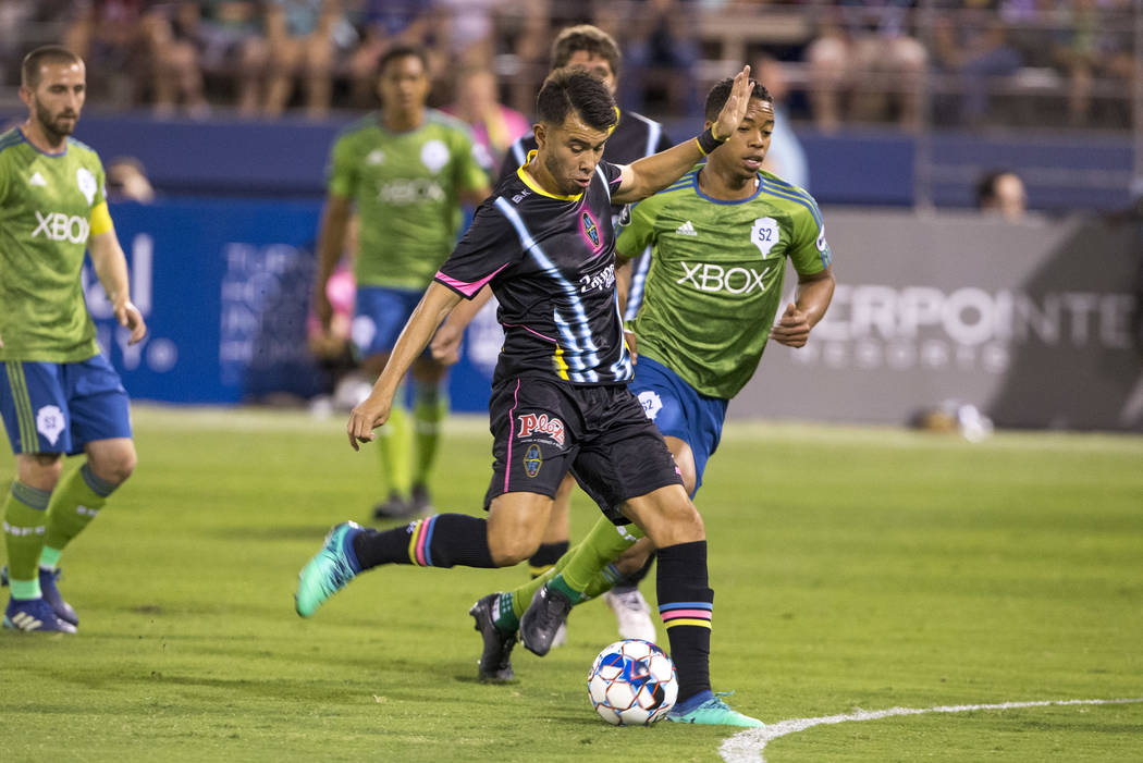 Las Vegas Lights FC midfielder Carlos Alvarez (7) takes a shot against the Seattle Sounders FC 2 during the first half of a United Soccer League match at Cashman Field in downtown Las Vegas on Sat ...