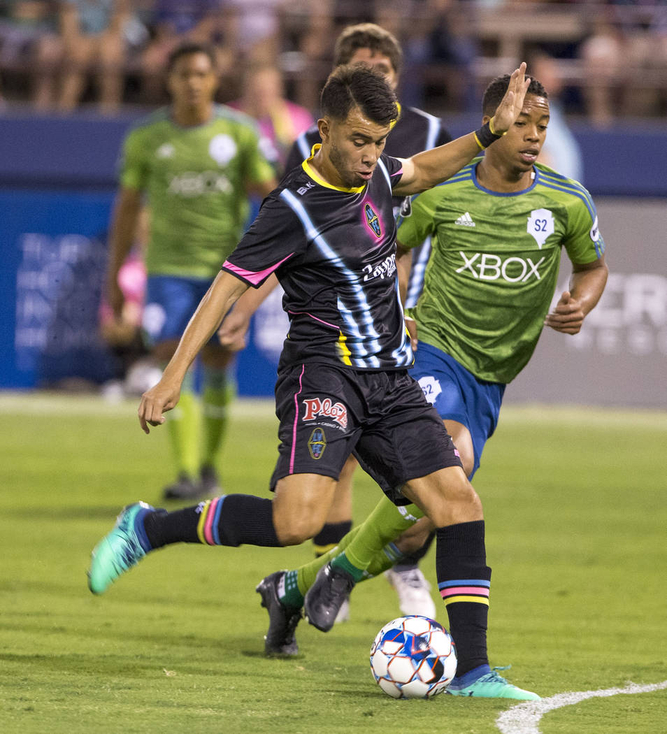 Las Vegas Lights FC midfielder Carlos Alvarez (7) takes a shot against the Seattle Sounders FC 2 during the first half of a United Soccer League match at Cashman Field in downtown Las Vegas on Sat ...