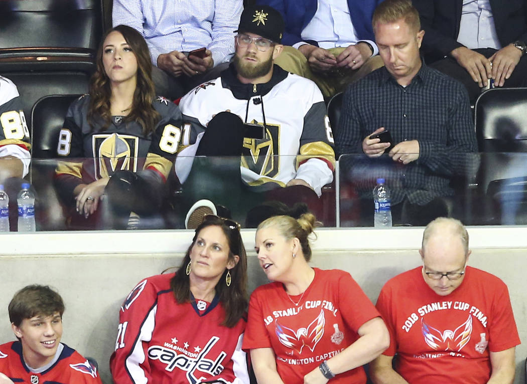 Washington Nationals player Bryce Harper, center, looks on at the start of Game 4 of the Stanley Cup Final at Capital One Arena in Washington on Monday, June 4, 2018. Chase Stevens Las Vegas Revie ...