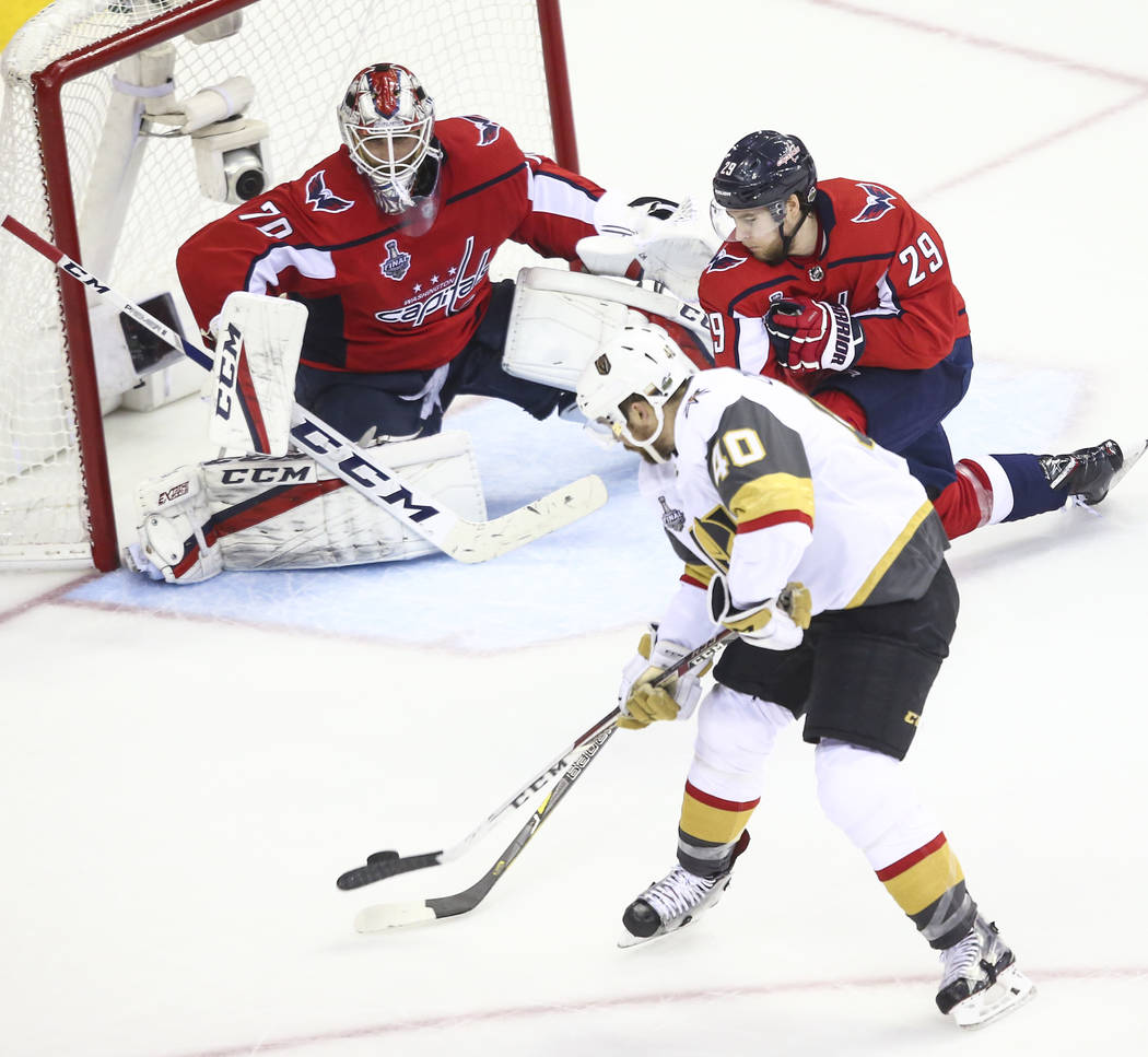 Golden Knights center Ryan Carpenter (40) shoots against Washington Capitals goaltender Braden Holtby (70) during the second period of Game 4 of the Stanley Cup Final at Capital One Arena in Washi ...