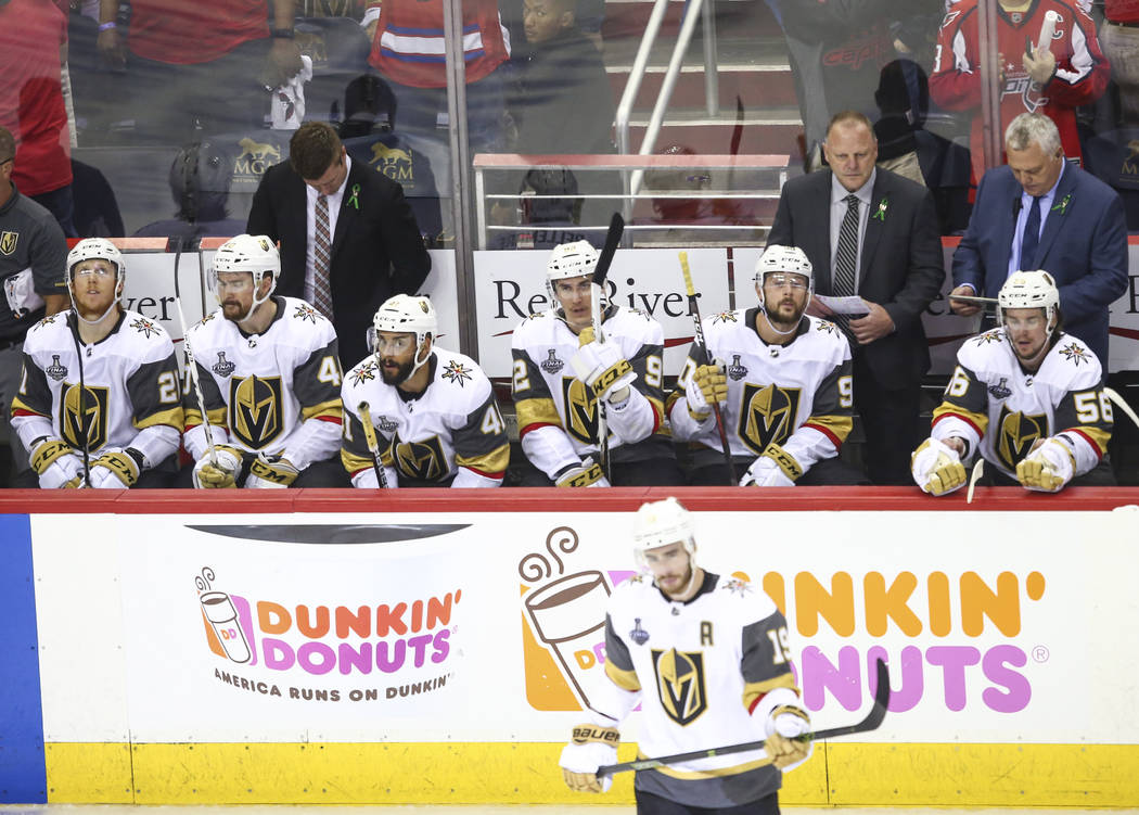 Golden Knights players react as they trail the Washington Capitals during the third period of Game 4 of the Stanley Cup Final at Capital One Arena in Washington on Monday, June 4, 2018. Chase Stev ...