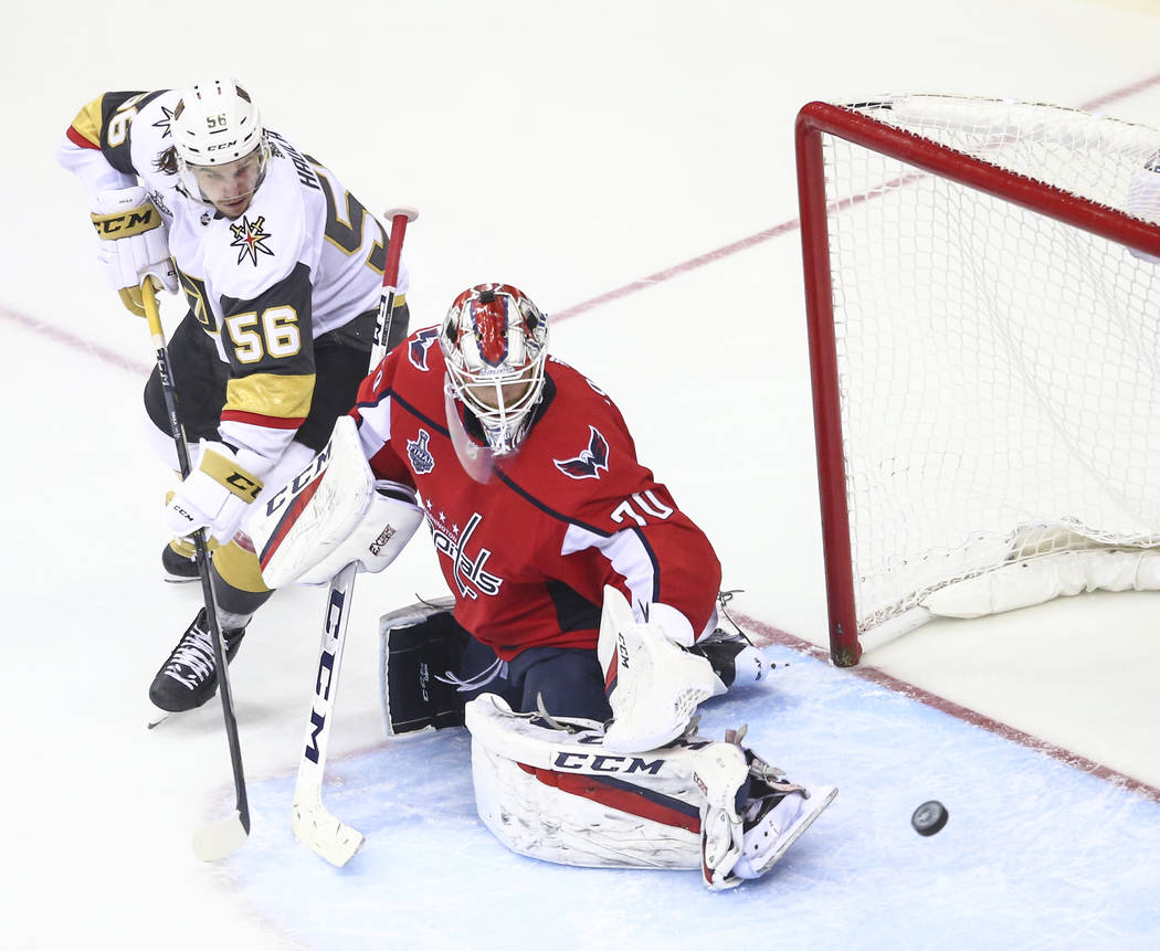 Washington Capitals goaltender Braden Holtby (70) blocks a shot in front of Golden Knights left wing Erik Haula (56) during the third period of Game 4 of the Stanley Cup Final at Capital One Arena ...