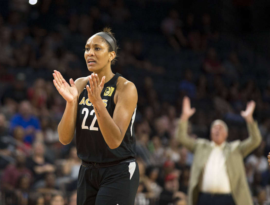 Las Vegas Aces center A'ja Wilson (22) reacts to a play against the Washington Mystics in the first half of a WNBA basketball game at the Mandalay Bay Events Center in Las Vegas on Friday, June 1, ...
