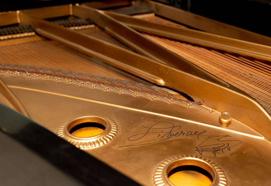This piano is signed by Liberace. (Tonya Harvey Real Estate Millions)